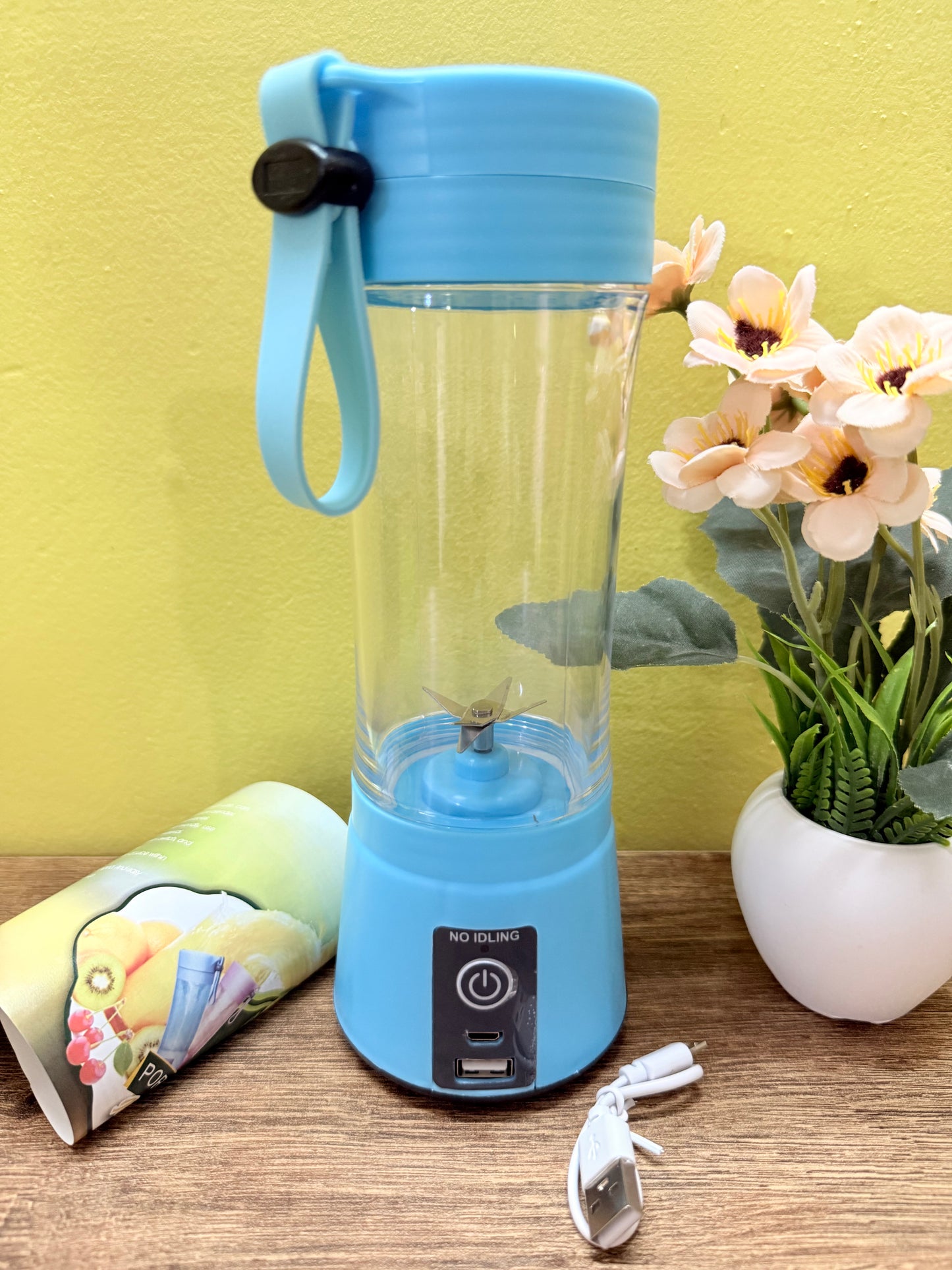 Portable 6-Blade Electric Juicer Blender with built-in jar. USB rechargeable, personal-size juicer, grinder, and mixer. Perfect for on-the-go smoothies. Available in multicolour.