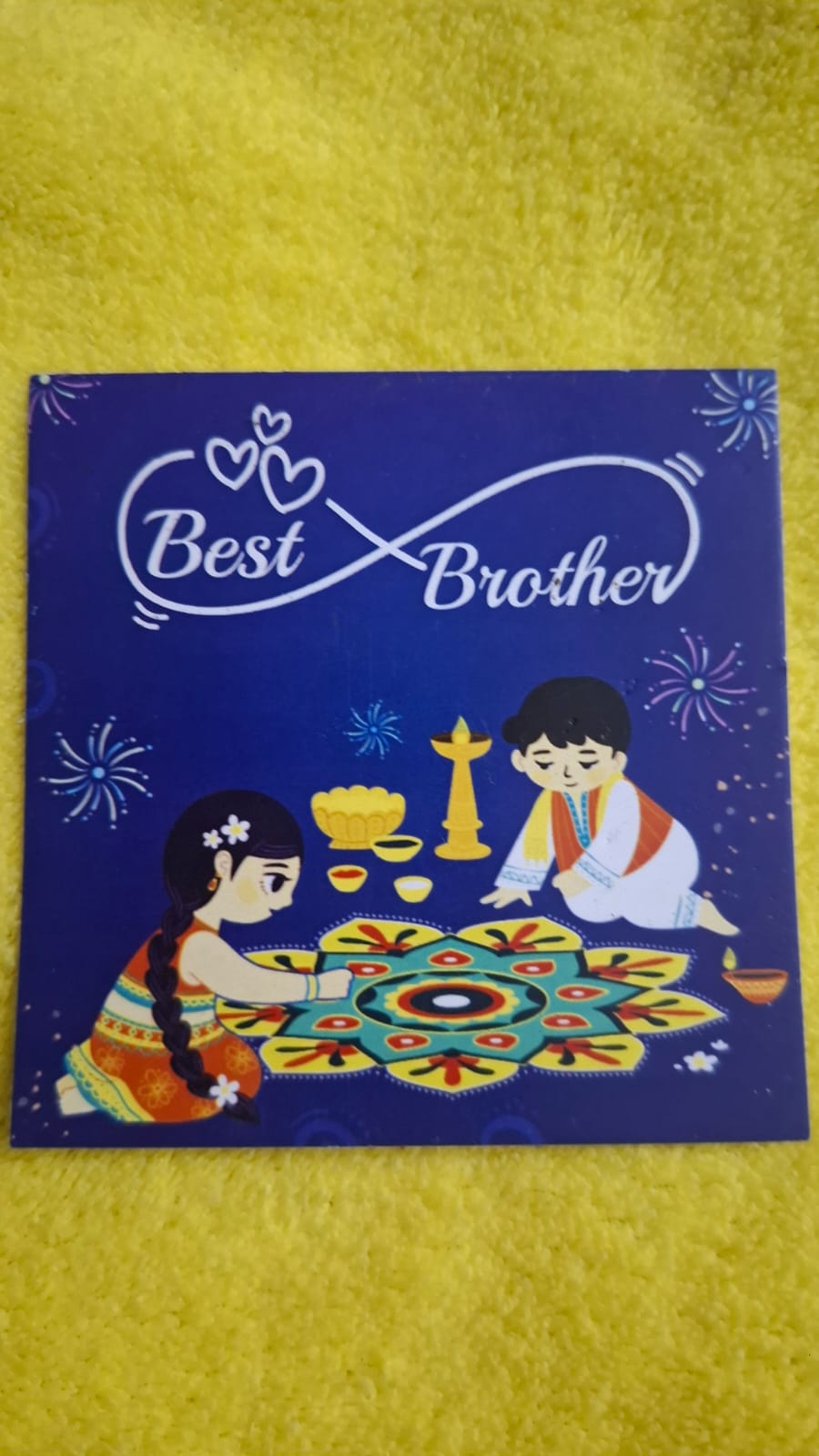 Cartoon light Rakhi with Celebration Cadbury Chocolate, Roli, Chawal, and Cute Card. (Random Color&Cartoon)