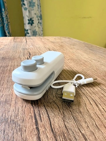 Portable Mini Bag Sealer, compact, magnetic, with cutter. Perfect for snacks, food & travel. Rechargeable & easy to use, Seal in freshness anywhere!
