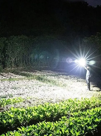 LED Rechargeable Torch Light with long-distance beam. Features a hammer for window glass breaking and a seat belt cutter. Perfect for car rescue and emergency situations. (